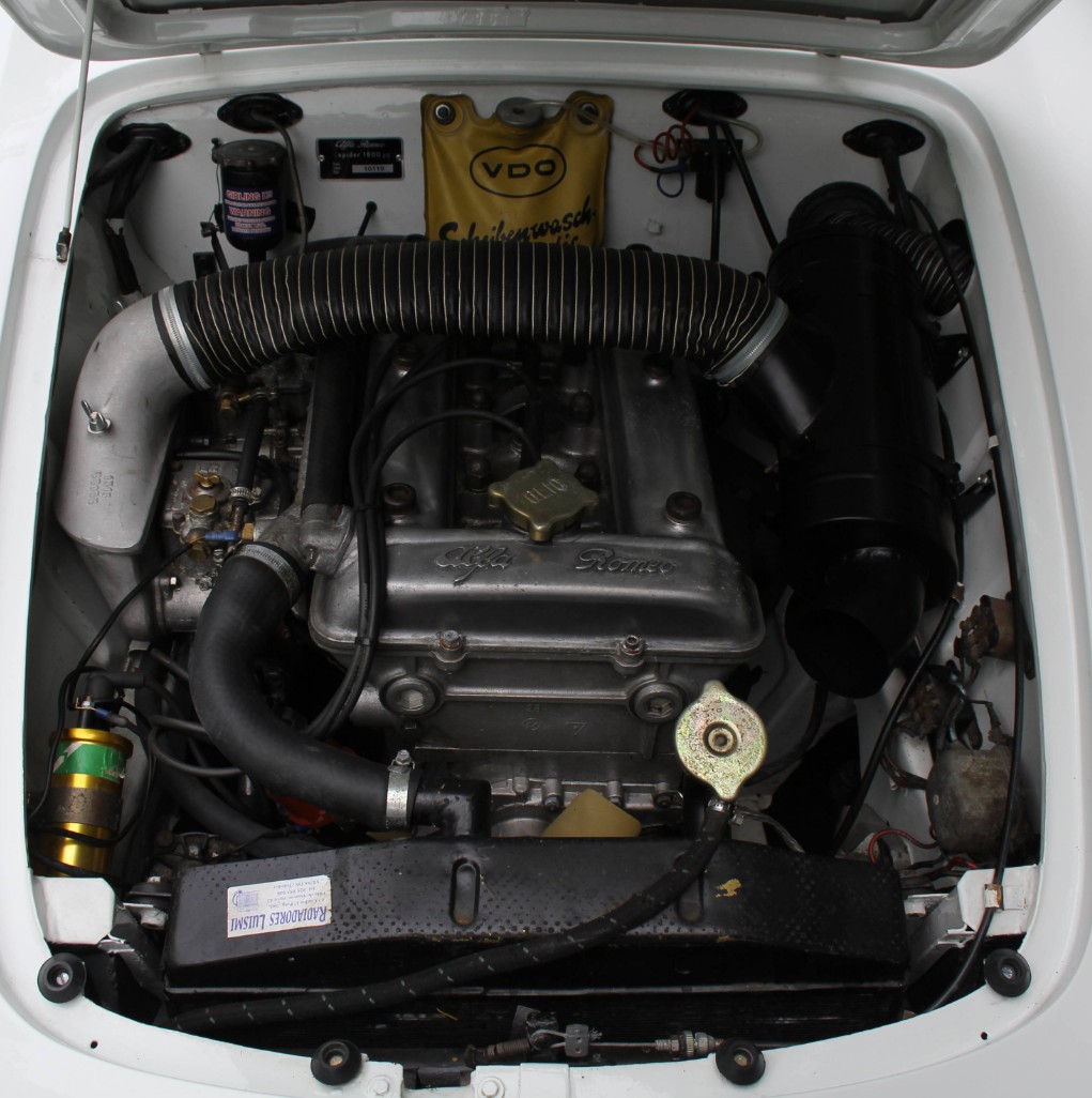 The Alfa twin-cam engine in RCA 379B, in a freshly painted white engine bay